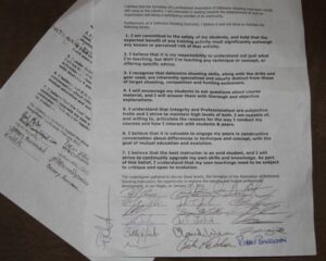 The original copy of The Tenets that was signed by many leaders in the training community at SHOT Show. 